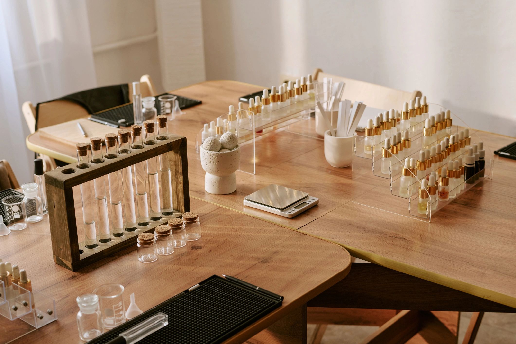 Botanical research laboratory workspace with plant-based formulation tools